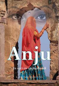 Anju, in sari en spijkerbroek